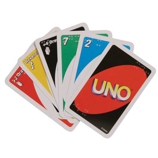 6 Uno cards fanned out with braille characters in the upper left and bottom right of the playing cards