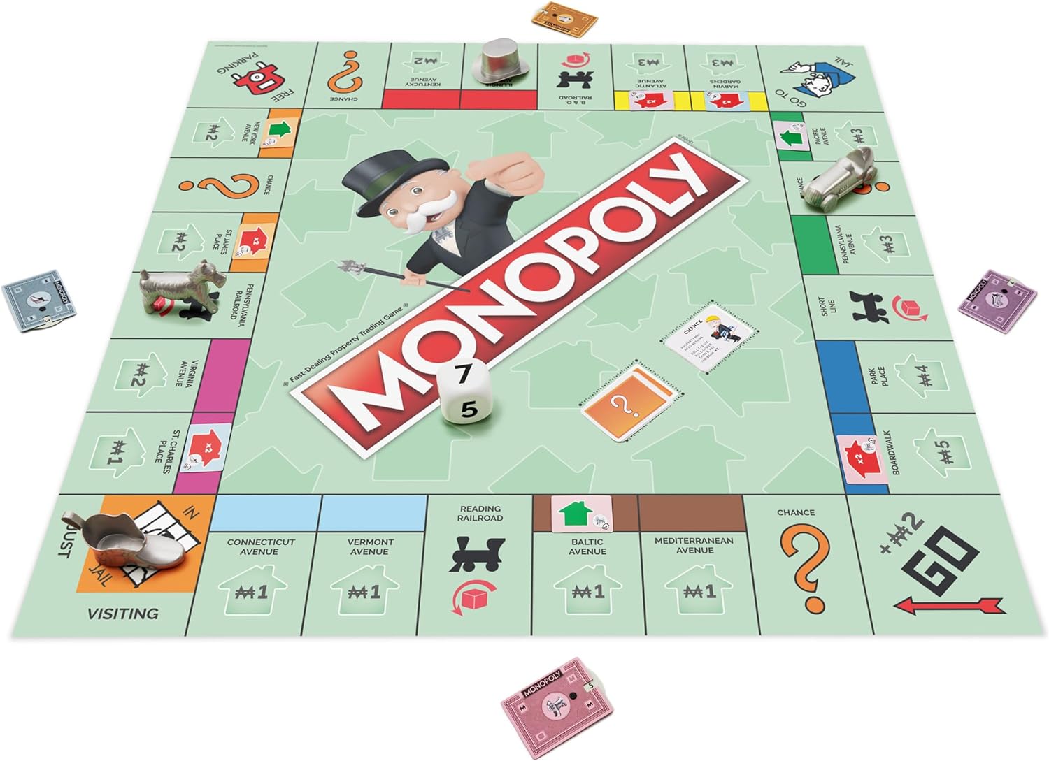 Giant onopoly Board game showing large medal piecws, large colorful playing cards, and colorful paper money.