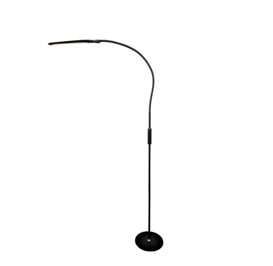 The Magno Lumina Max Floor Lamp is a sleek, modern black floor lamp with a sturdy round base and an adjustable, curved neck for positioning light. It is designed for individuals with low vision, offering customizable lighting options. Users can select from five color temperatures (3000K to 6500K, similar to natural daylight) and dim the brightness to suit their viewing needs. The lamp features energy-efficient LEDs, a touch control panel, and a remote control with extra settings like a night light.